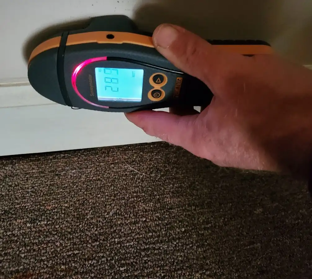 Moisture detection at baseboard during Burst Pipe Cleanup in Cheyenne